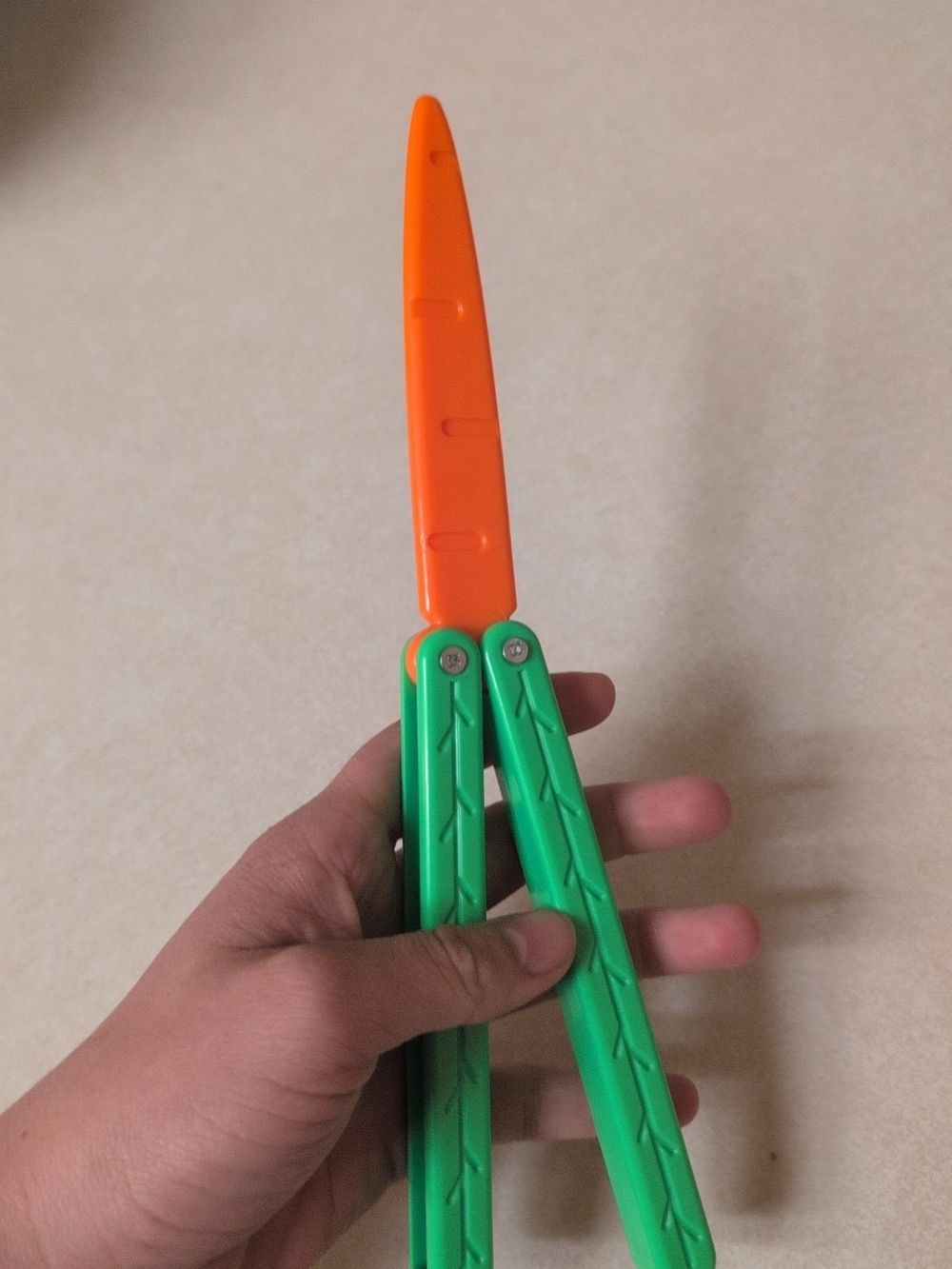Fun Carrot Fidget Toy Trainer, Folds & Flips - Like New